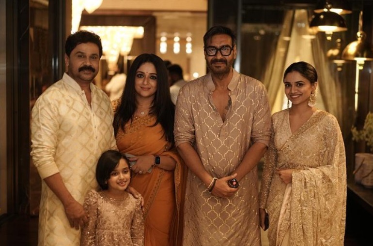 Malayalam star couple Dileep and Kavya Madhavan posed with Ajay Devgn