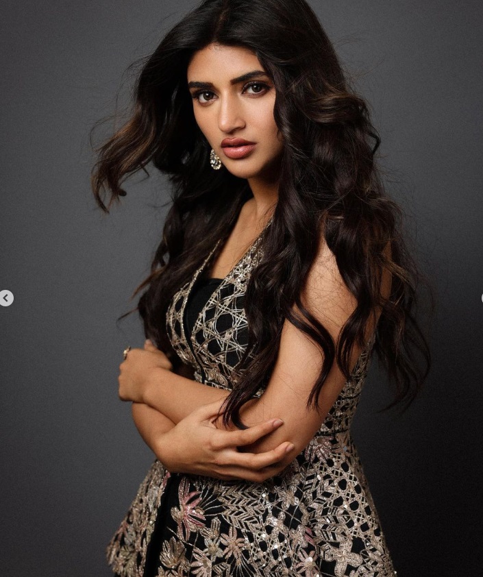 Sreeleela dazzles in Varun Nidhika's midnight black peplum jacket set